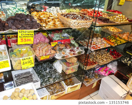 Buying sweets at a confectionery shop in Athens, Greece 135153746