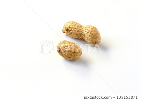 Shelled peanuts on white background Shelled peanuts on white background 135153871