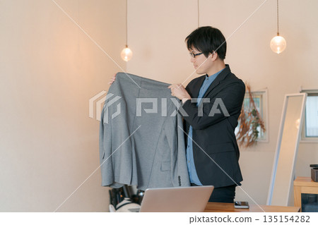 Men working in the apparel industry 135154282