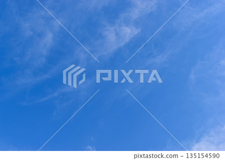 beautiful blue sky and white fluffy group of clouds with sunrise in the morning, natural background beautiful blue sky and white fluffy group of clouds with sunrise in the morning, natural background 135154590