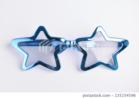 blue star shape of glasses on white background 135154596