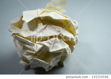 round lump paper on grey background, recycle used paper round lump paper on grey background, recycle used paper 135154598