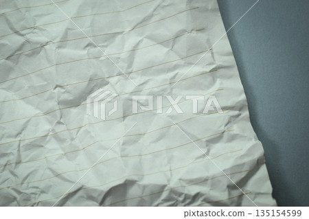 crumpled line paper texture on grey background, blank sheet notebook crumpled line paper texture on grey background, blank sheet notebook 135154599