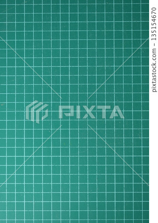 green cutting mat board background with line and scale measure guide pattern for object art design green cutting mat board background with line and scale measure guide pattern for object art design 135154670