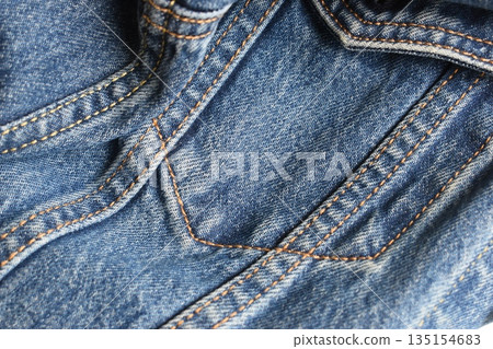 seam of blue denim texture background, jean fashion style 135154683
