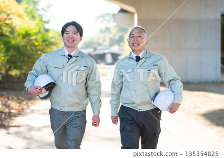 Walking veterans and young engineers 135154825