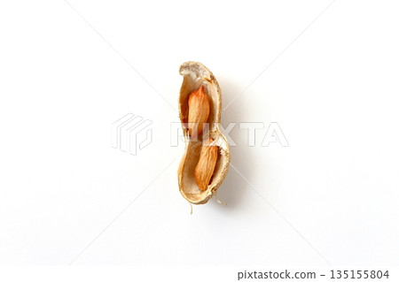 Shrunken peanuts with shriveled kernels viewed from directly above on a white background Shrunken peanuts with shriveled kernels viewed from directly above on a white background 135155804