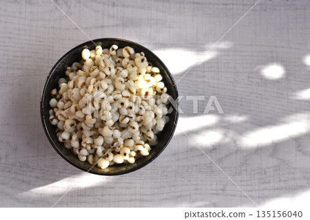 Boiled Job's tears in black bowl-Healthy Food. Boiled Job's tears in black bowl-Healthy Food. 135156040