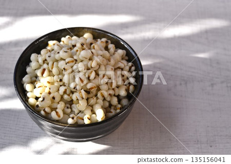 Boiled Job's tears in black bowl-Healthy Food. Boiled Job's tears in black bowl-Healthy Food. 135156041