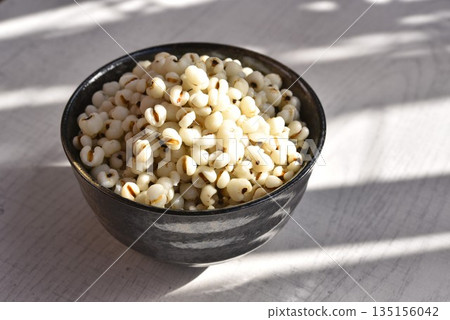 Boiled Job's tears in black bowl-Healthy Food. Boiled Job's tears in black bowl-Healthy Food. 135156042