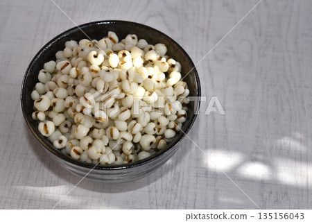 Boiled Job's tears in black bowl-Healthy Food. Boiled Job's tears in black bowl-Healthy Food. 135156043