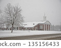 Classic Church Building with Green Lawn and Steeple in winter time Classic Church Building with Green Lawn and Steeple in winter time 135156433