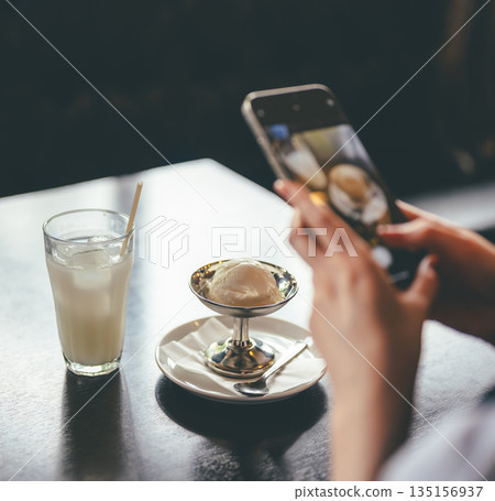 At the cafe At the cafe 135156937