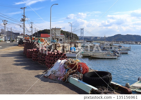 Shimotsui Fishing Port and the Great Seto Bridge in the Setouchi Inland Sea (Kojima, Kurashiki City, Okayama Prefecture) 135156961