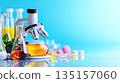 Microscope, science experiment and chemistry laboratory equipment on bright blue background 135157060