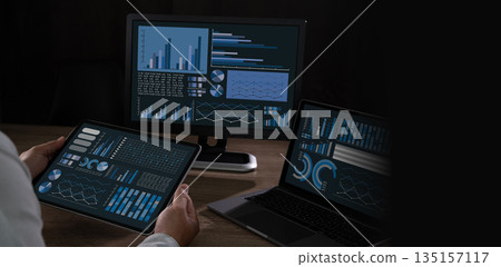 man interacting with an operations dashboard or control interface, representing workflow, system management and operational efficiency dashboard for data man interacting with an operations dashboard or control interface, representing workflow, system management and operational efficiency dashboard for data 135157117