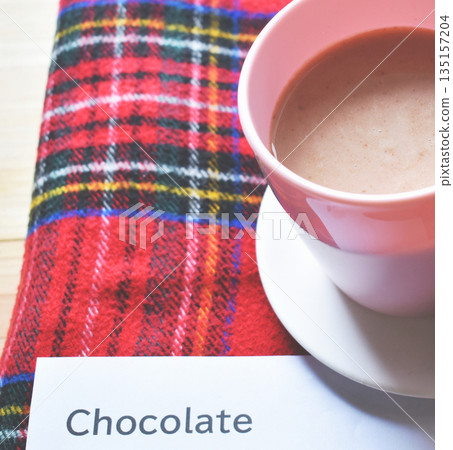 Close-up of hot chocolate with the word "chocolate" in English Close-up of hot chocolate with the word "chocolate" in English 135157204