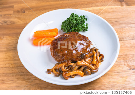 Hamburger steak with mushroom sauce Hamburger steak with mushroom sauce 135157406