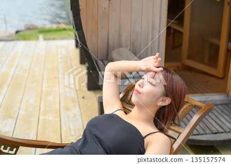 A woman resting after the sauna. (Photo courtesy of Oki Seaside Resort Miyabi) 135157574