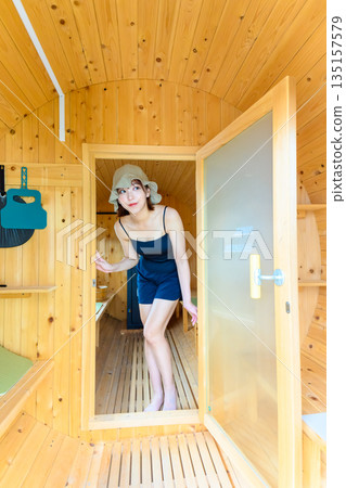 A woman coming out of a sauna (Photo courtesy of Oki Seaside Resort Miyabi) A woman coming out of a sauna (Photo courtesy of Oki Seaside Resort Miyabi) 135157579