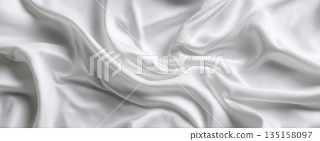 White fabric texture with soft folds and smooth surface creating calm and elegant background for design or decoration 135158097
