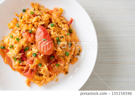 Stir-fried tomatoes with egg or Scrambled eggs with tomatoes Stir-fried tomatoes with egg or Scrambled eggs with tomatoes 135158598