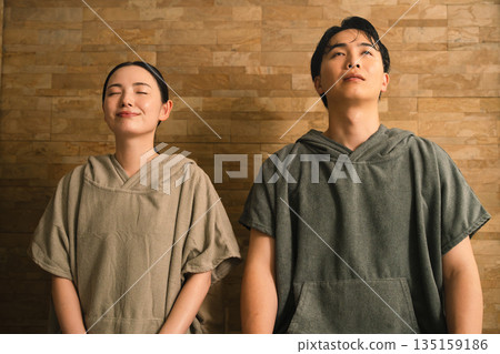 Young couple sweating in the sauna Beauty image 135159186