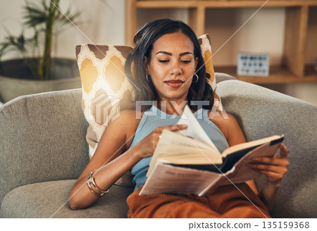 Woman relax on couch, reading book at house and break on the weekend with literature, fantasy story and peace. Female person with hobby, leisure and chill at home, read for knowledge and information Woman relax on couch, reading book at house and break on the weekend with literature, fantasy story and peace. Female person with hobby, leisure and chill at home, read for knowledge and information 135159368