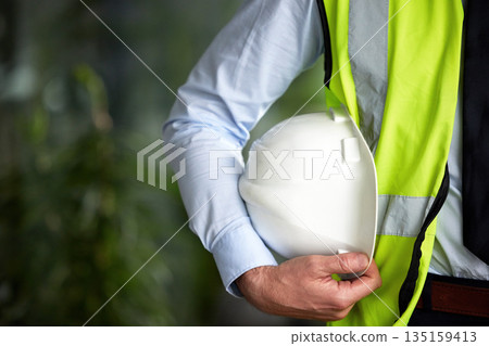 Construction worker, hand and safety gear with helmet for engineering and architecture project. Outdoor, mockup and engineering employee hands with safety vest for architect job and expert work 135159413