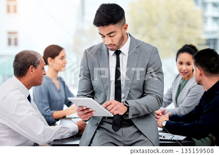 Tablet, business meeting and man reading, typing or search online news, employee management or planner and schedule. Check, scroll and professional people with digital report or agenda on technology 135159508