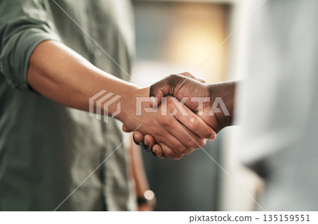 Closeup, business and men with handshake, collaboration and partnership with agreement, deal or teamwork. Zoom, coworkers or staff shaking hands, promotion or opportunity with goal, contract or trust Closeup, business and men with handshake, collaboration and partnership with agreement, deal or teamwork. Zoom, coworkers or staff shaking hands, promotion or opportunity with goal, contract or trust 135159551