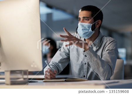 Call center, man and communication with mask at computer while writing notes for advice, customer service and sales. Male telemarketing agent, virus protection and desktop for consulting questions Call center, man and communication with mask at computer while writing notes for advice, customer service and sales. Male telemarketing agent, virus protection and desktop for consulting questions 135159608