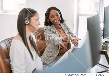 Call center, training and black woman with consultant at computer at help desk with advice from team leader. Learning, planning and help, women and mentor coaching staff in customer service agency. Call center, training and black woman with consultant at computer at help desk with advice from team leader. Learning, planning and help, women and mentor coaching staff in customer service agency. 135159775