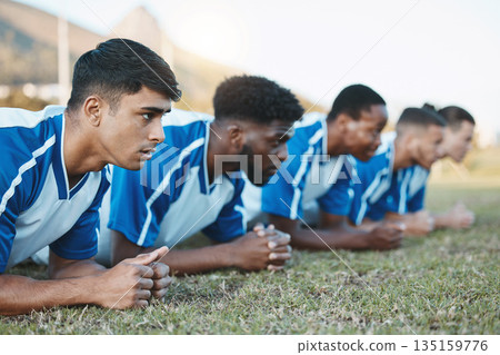 Sports group, soccer and team plank on field for fitness training, workout or exercise outdoor. Football player, club and diversity athlete men with focus for strong competition or sport challenge 135159776