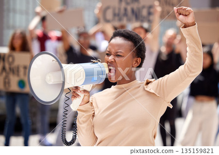 Equality, protest and black woman leader with megaphone and shouting loud for justice due to government problem. Justice, angry and person fist up for politics fight or freedom with frustrated group 135159821