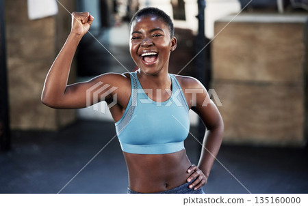Portrait, fitness or happy black woman flexing with strong biceps muscle or body goals in training workout. Exercise, powerful arms or healthy African girl sports athlete excited by results at gym 135160000