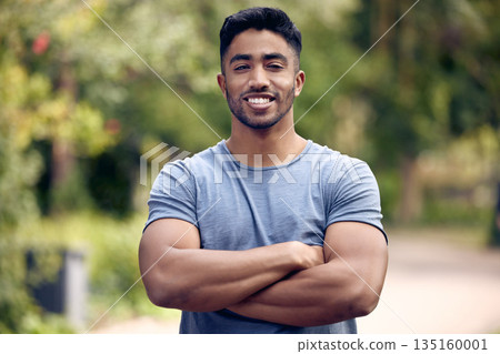 Portrait, fitness and man with arms crossed, outdoor and exercise for wellness, training and workout goal. Face, male person or athlete with health, motivation or sports in a park, happiness and calm 135160001