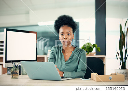Portrait, serious and black woman with laptop, writer and creative in office workplace. Computer, face and female entrepreneur, copywriter and professional from South Africa with business mockup. 135160053
