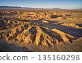 Breathtaking Aerial View of a Stunning Desert Landscape at Golden Hour 135160298