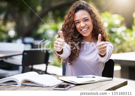Thumbs up, studying and portrait of woman at outdoor campus, happy remote work or education books. Study, college and face of student or african person like, yes and thanks or success sign and hands Thumbs up, studying and portrait of woman at outdoor campus, happy remote work or education books. Study, college and face of student or african person like, yes and thanks or success sign and hands 135160311