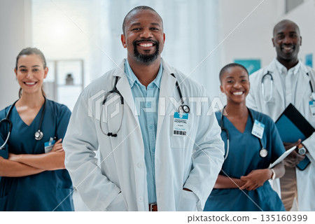 Teamwork, happy and portrait of doctors in hospital for medical help, insurance and service. Healthcare, collaboration and men and women health workers smile in clinic for help, consulting and care Teamwork, happy and portrait of doctors in hospital for medical help, insurance and service. Healthcare, collaboration and men and women health workers smile in clinic for help, consulting and care 135160399