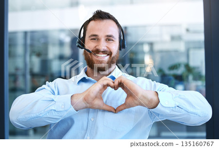 Callcenter agent, man with smile and heart hands in portrait, love customer service job and feedback. Hand gesture, care emoji and male consultant is happy with job at contact center and tech support 135160767