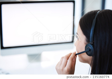 Woman, call center and consulting with mockup screen in customer service, support or telemarketing at office. Female person, consultant or agent talking with headphones and mock up space at workplace 135160774
