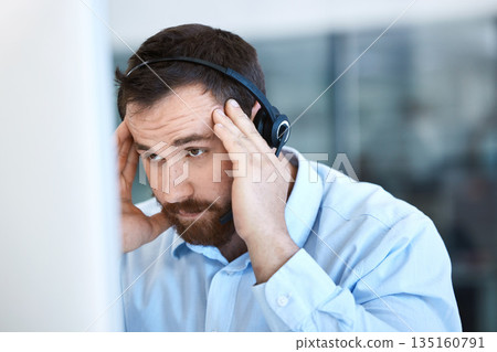 Stress, computer and tired call center man with a headset for customer support problem or headache. Frustrated person at pc for telemarketing account crisis, contact us or sales fail, mistake or loss Stress, computer and tired call center man with a headset for customer support problem or headache. Frustrated person at pc for telemarketing account crisis, contact us or sales fail, mistake or loss 135160791