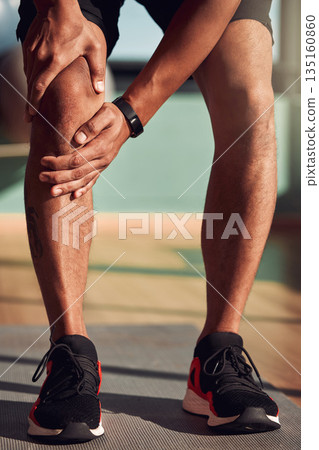 Fitness, exercise and legs of man with knee pain in gym with injury after running, training and workout. Medical accident, wellness and closeup of male person for muscle strain, joint ache and hurt Fitness, exercise and legs of man with knee pain in gym with injury after running, training and workout. Medical accident, wellness and closeup of male person for muscle strain, joint ache and hurt 135160860