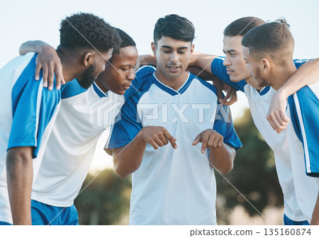 Sports group, soccer and team talking and planning on field for fitness training or competition. Football player, club and diversity athlete men together for scrum, game plan and teamwork outdoor 135160874
