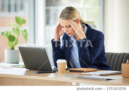 Professional, woman and working and frustrated with a headache in the office with entrepreneur. Stress, burnout and business person with fatigue, anxiety at a workplace with 404 glitch on laptop. 135161039