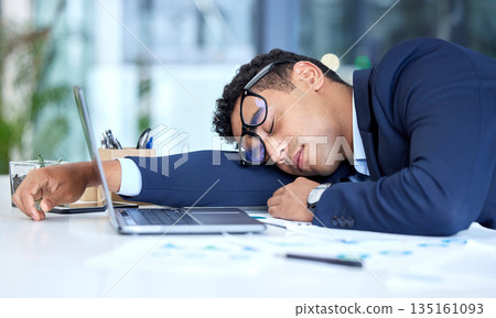 Tired, sleeping and business man in office with stress, burnout and low energy. Sleep, fatigue and male employee exhausted after challenge, problem and lazy crisis, overworked and sick in workplace. 135161093