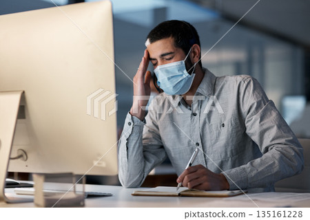 Call center, man and headache with face mask at computer for stress, burnout or problem with client communication. Tired telemarketing consultant with virus protection for crisis, bad service or pain Call center, man and headache with face mask at computer for stress, burnout or problem with client communication. Tired telemarketing consultant with virus protection for crisis, bad service or pain 135161228