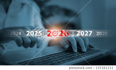 Business goals and 2026 planning concept with businessman touching screen on laptop. Business goals and 2026 planning concept with businessman touching screen on laptop. 135161231